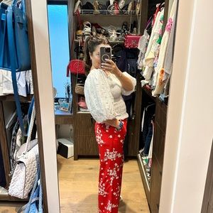 100% silk red pants with white flowers. Fully lined with side zipper